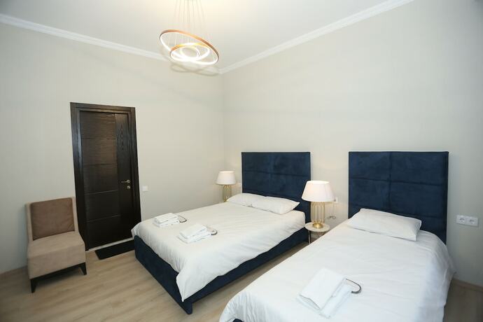 Imagen de la habitación del Hotel Rivendell Umbrella Collections. Foto 19