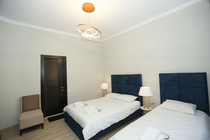 Imagen de la habitación del Hotel Rivendell Umbrella Collections. Foto 20