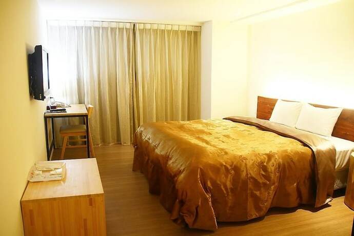 Imagen de la habitación del Hotel River, Chiayi City. Foto 24