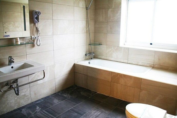 Imagen de la habitación del Hotel River, Chiayi City. Foto 32