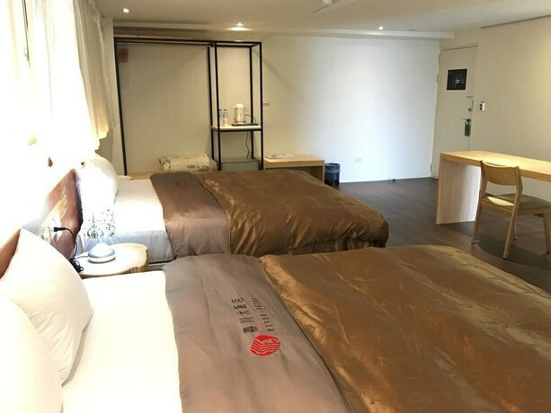 Imagen de la habitación del Hotel River, Chiayi City. Foto 34