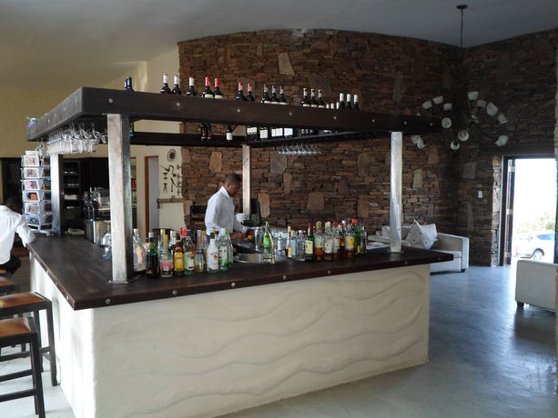 Imagen del bar/restaurante del Hotel River Crossing Lodge. Foto 5