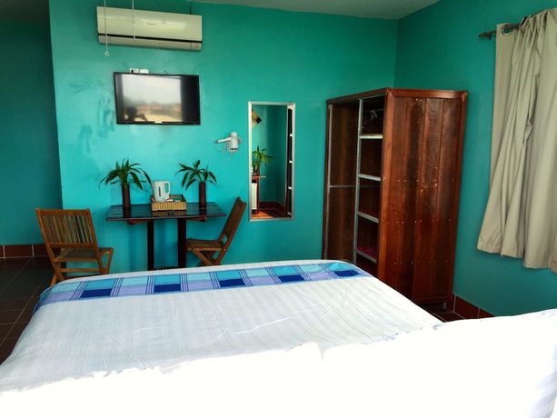 Imagen de la habitación del Hotel River Dolphin. Foto 11