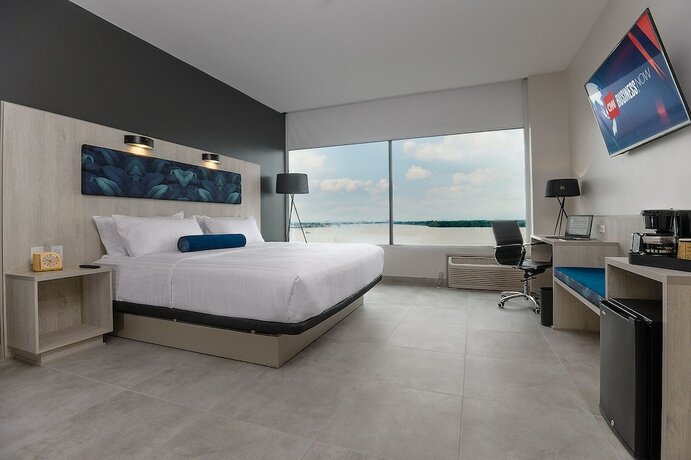 Imagen de la habitación del Hotel River Garden And Suites. Foto 16