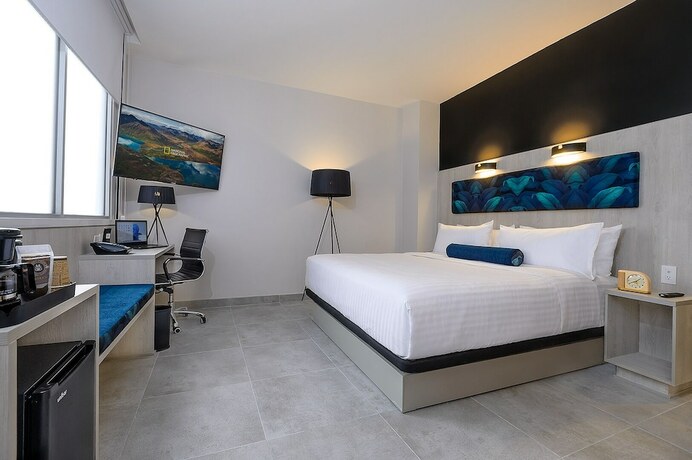 Imagen de la habitación del Hotel River Garden And Suites. Foto 17