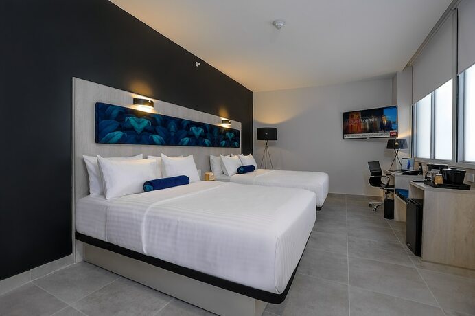 Imagen de la habitación del Hotel River Garden And Suites. Foto 20