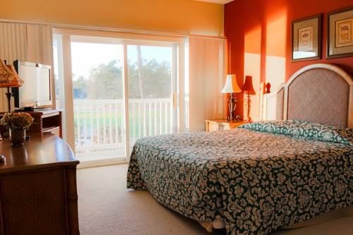 Imagen de la habitación del Hotel River Oaks Resort. Foto 16
