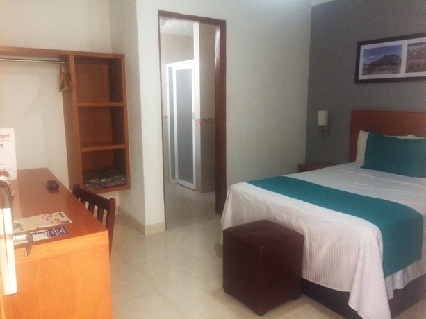 Imagen de la habitación del Hotel River Poliforum. Foto 4