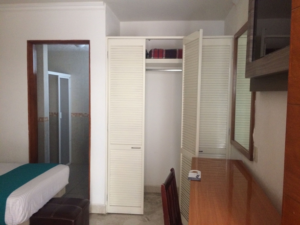 Imagen de la habitación del Hotel River Poliforum. Foto 9