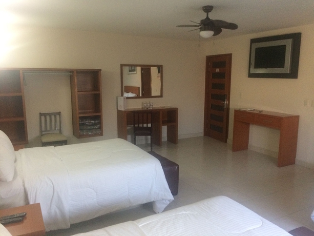 Imagen de la habitación del Hotel River Poliforum. Foto 10