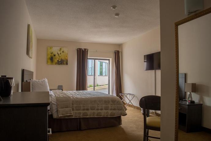 Imagen de la habitación del Hotel River Rapids Inn. Foto 3