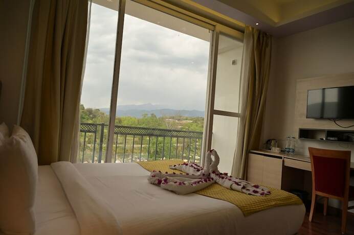 Imagen de la habitación del Hotel River Retreat. Foto 19