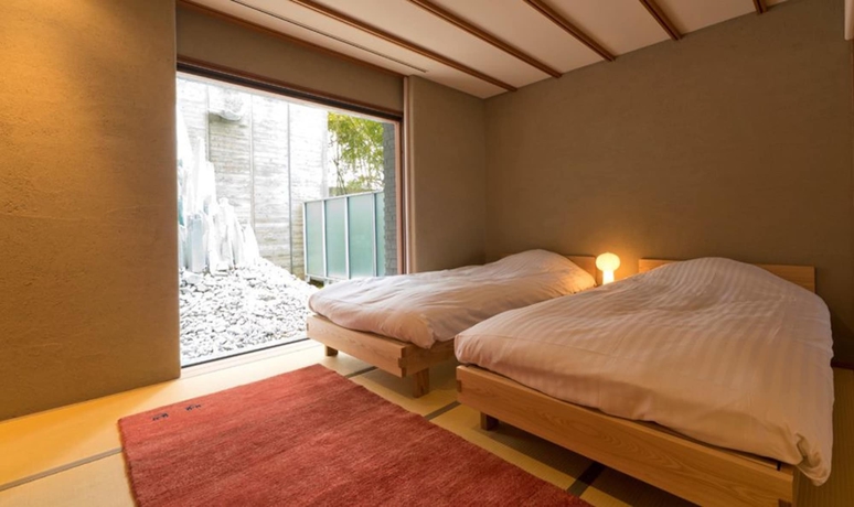 Imagen de la habitación del Hotel River Retreat Garaku. Foto 6