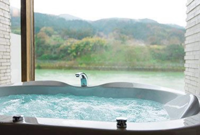 Imagen de la habitación del Hotel River Retreat Garaku. Foto 8