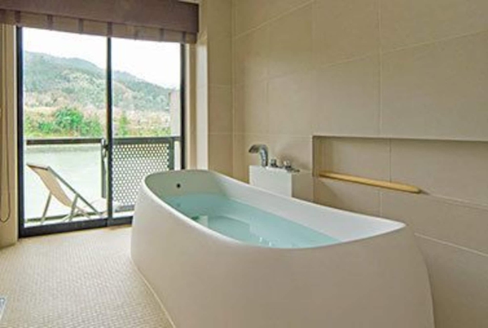 Imagen de la habitación del Hotel River Retreat Garaku. Foto 15