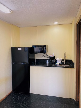 Imagen de la habitación del Hotel River Side Inn. Foto 11