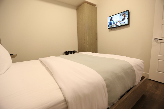 Imagen de la habitación del Hotel River Station Suite. Foto 10
