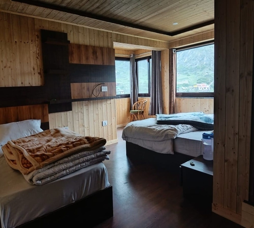 Imagen de la habitación del Hotel River View, Badrinath. Foto 4