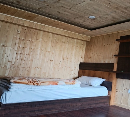 Imagen de la habitación del Hotel River View, Badrinath. Foto 5