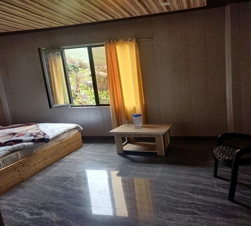 Imagen de la habitación del Hotel River View, Badrinath. Foto 7