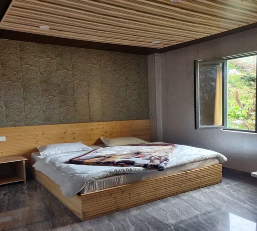 Imagen de la habitación del Hotel River View, Badrinath. Foto 8
