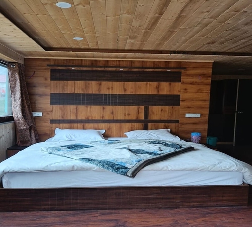 Imagen de la habitación del Hotel River View, Badrinath. Foto 11