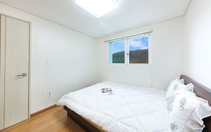 Imagen de la habitación del Hotel River View Pension. Foto 11