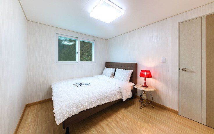 Imagen de la habitación del Hotel River View Pension. Foto 16