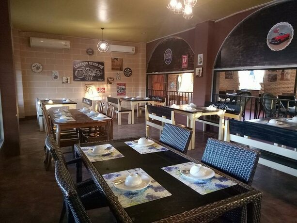 Imagen del bar/restaurante del Hotel River and Flowers Resort. Foto 17