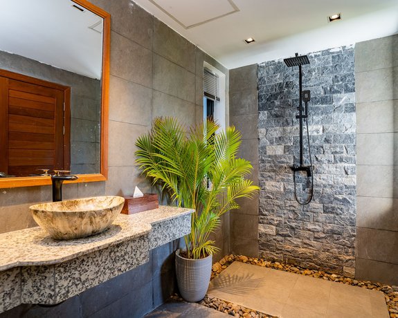 Imagen de la habitación del Hotel RiverTree Villa and Resort. Foto 7