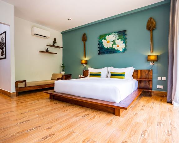 Imagen de la habitación del Hotel RiverTree Villa and Resort. Foto 8