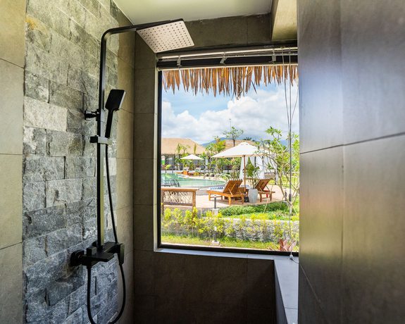 Imagen de la habitación del Hotel RiverTree Villa and Resort. Foto 9