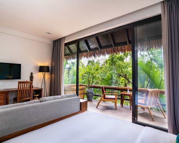 Imagen de la habitación del Hotel RiverTree Villa and Resort. Foto 10