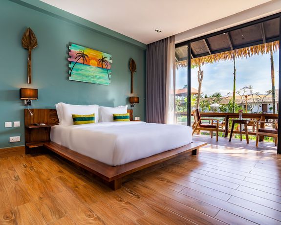 Imagen de la habitación del Hotel RiverTree Villa and Resort. Foto 12