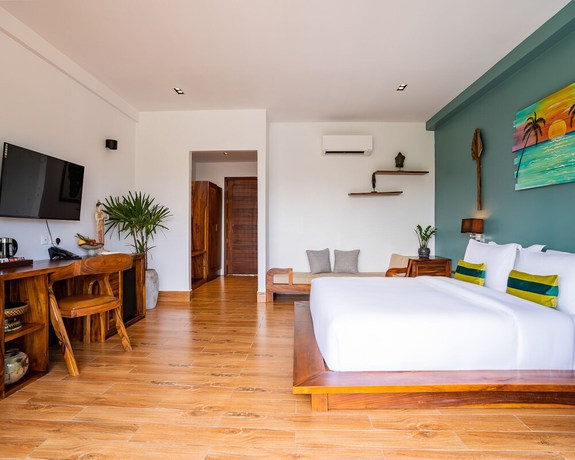 Imagen de la habitación del Hotel RiverTree Villa and Resort. Foto 14