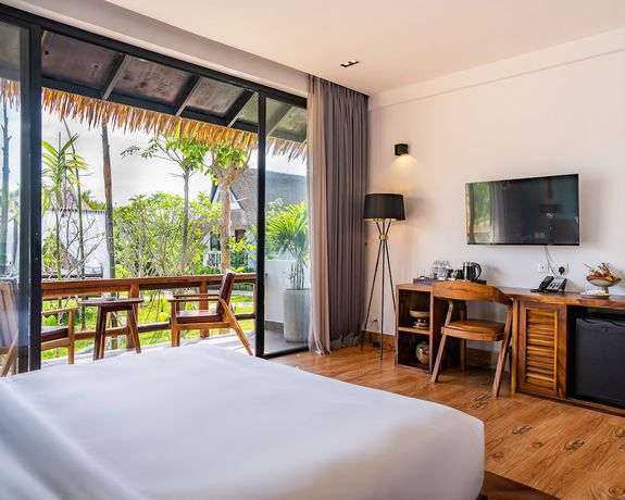 Imagen de la habitación del Hotel RiverTree Villa and Resort. Foto 17