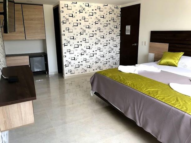 Imagen de la habitación del Hotel Rivera Central. Foto 16