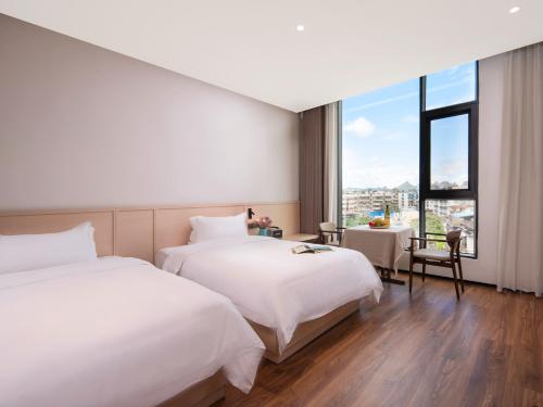 Imagen de la habitación del Hotel Riverbank. Foto 14