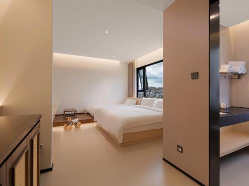 Imagen de la habitación del Hotel Riverbank. Foto 15