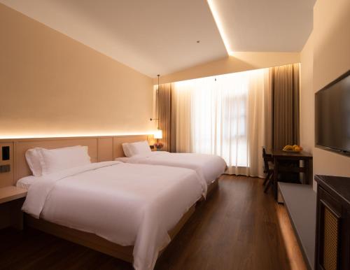 Imagen de la habitación del Hotel Riverbank. Foto 17