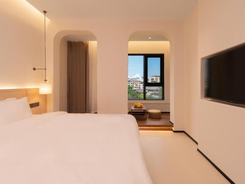 Imagen de la habitación del Hotel Riverbank. Foto 19