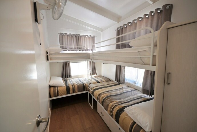 Imagen de la habitación del Hotel Rivergardens Holiday Park. Foto 15