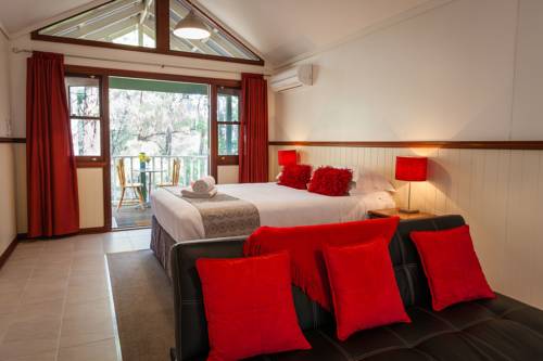 Imagen de la habitación del Hotel Riverglen Chalets. Foto 3