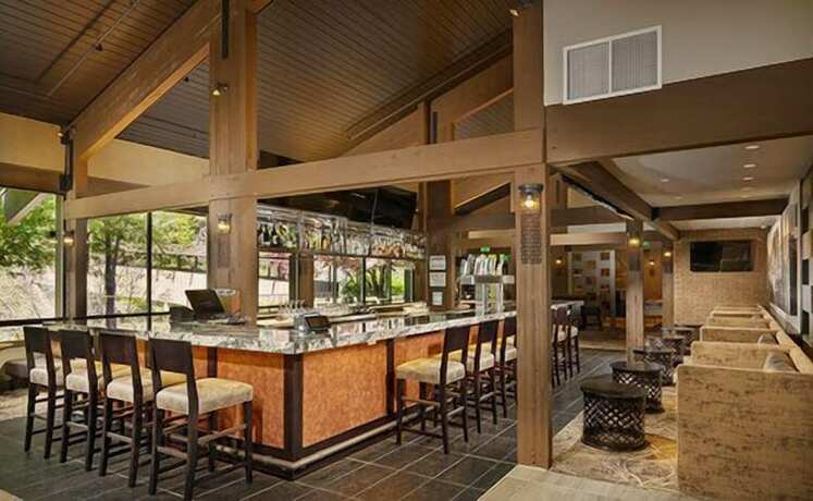 Imagen del bar/restaurante del Hotel Riverhouse Lodge. Foto 10