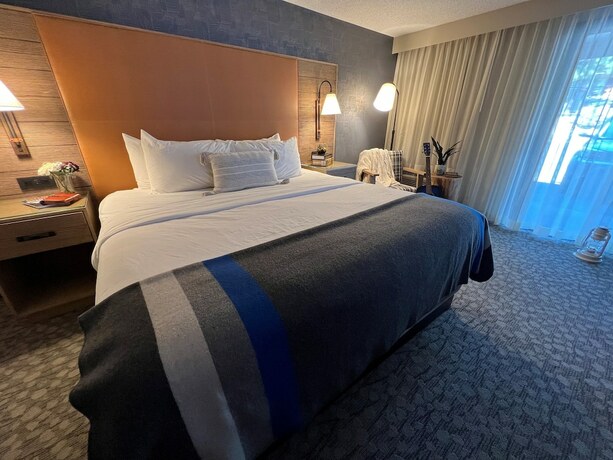 Imagen de la habitación del Hotel Riverhouse Lodge. Foto 13
