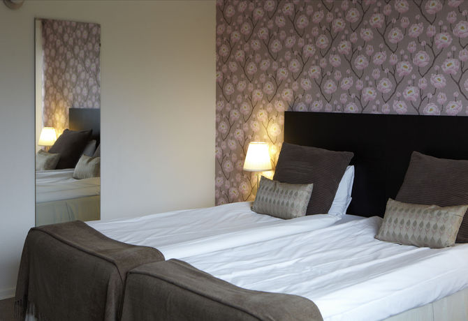 Imagen de la habitación del Hotel Riverside And Apartments. Foto 7