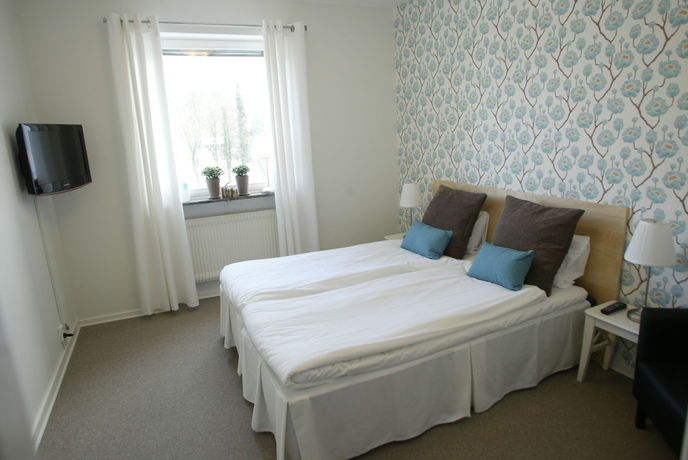 Imagen de la habitación del Hotel Riverside And Apartments. Foto 11