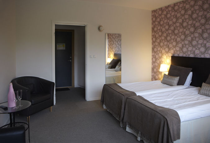 Imagen de la habitación del Hotel Riverside And Apartments. Foto 13