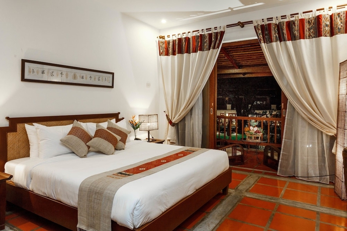 Imagen de la habitación del Hotel Riverside Boutique Resort, Vang Vieng. Foto 4