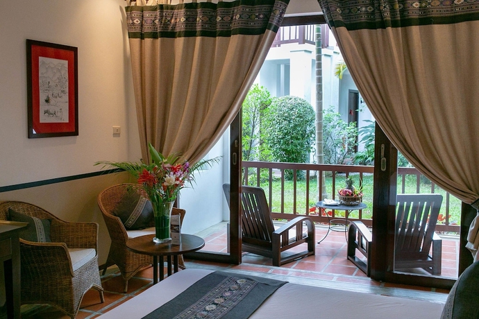 Imagen de la habitación del Hotel Riverside Boutique Resort, Vang Vieng. Foto 12